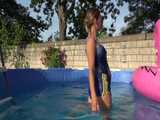 Get a new video with Sandra enjoying the Summer in the Garden with Table-Tennis and a Pool in her shiny nylon Shorts 10
