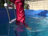 Watch Sandra watering the garden and wetting her shiny nylon oldschool Rainsuit in the Pool 5